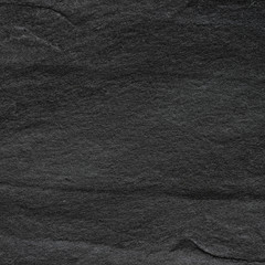 Dark grey black slate background or texture.