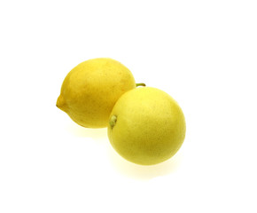 Two lemon isolated on white background. Tropical fruit.