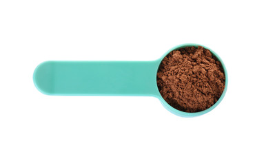 Scoop of protein powder on white background, top view