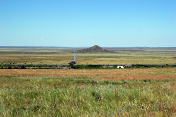 Obraz premium Beautiful view along the road to the lake across the steppe