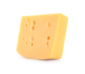 Piece of delicious cheese on white background