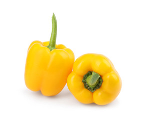 Ripe yellow bell peppers isolated on white