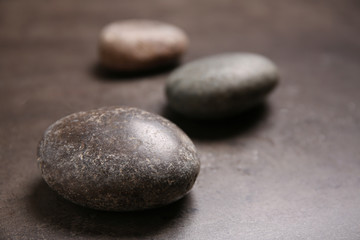 Fototapeta na wymiar Spa stones on table. Space for text