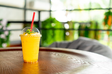 mango smoothies glass in cafe