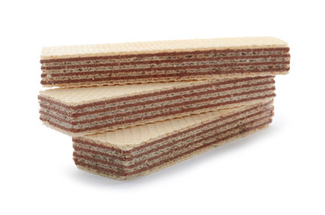 Delicious crispy wafers on white background. Sweet food