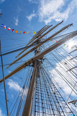 The middle mast with the six sails of tall ship Cisne Branco in the harbour of Scheveningen during the Sail on Scheveningen, Netherlands
