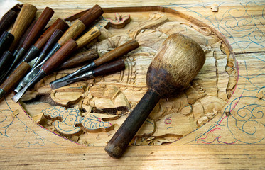 Old wood hammer and various of wood carving tools for skillfull wooden timber carpenter art work...