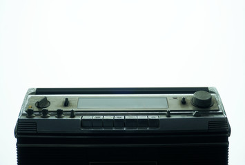 Obraz premium Frontview part of vintage cassette tape with white backgound.