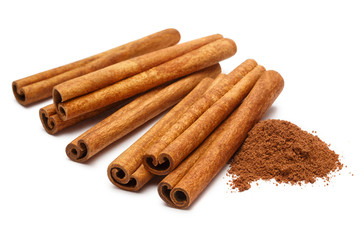 Cinnamon sticks and powder, isolated on white background