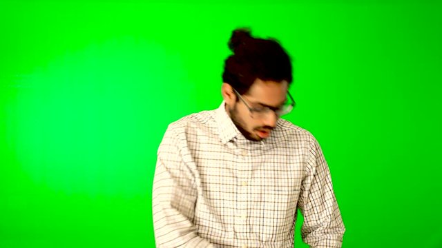 Indian business man using mobile green screen
