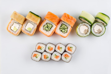 Classic sushi roll sets. Sushi on a white background. Japanese sushi seafood roll white background. Close-up.