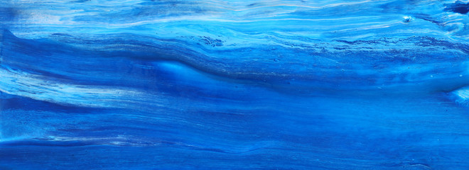 Obraz premium photography of abstract marbleized effect background. Blue and white creative colors. Beautiful paint. banner