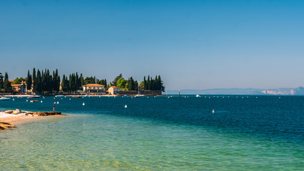 Lake Gardasee Water view during Summer vacation time with a mediterranean feeling