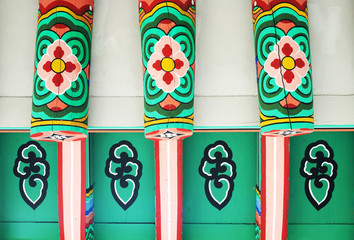 Dancheong, traditional Korean multicolored paintwork on wooden roof .