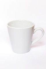 White ceramic mug isolated on white background