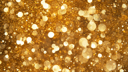 Explosion of golden glitter dots.