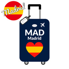 Luggage with airport station code IATA or location identifier and destination city name Madrid, MAD. Travel to Spain, Europe concept. Heart shaped flag of the Spain on baggage.