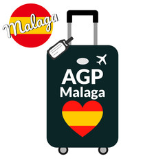 Luggage with airport station code IATA or location identifier and destination city name Malaga, AGP. Travel to Spain, Europe concept. Heart shaped flag of the Spain on baggage.