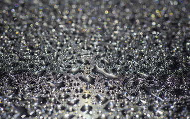 image Silver liquid and black sparkling background