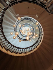 Fototapeta premium Spiral staircase with lights