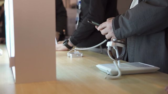 Buying a smartphone and smart watches in the store