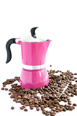 Coffee bean, pink coffee pot and spoons on white background