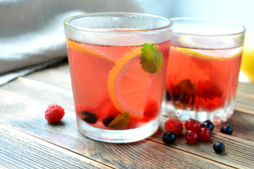 Cold berry lemonade in glasses Summer refreshing drink