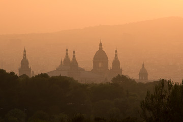 Fototapeta premium Silhouette of the National Museum in Barcelona in haze Barcelona, Spain