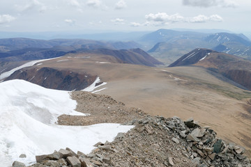 Obraz premium Altai mountainous landscape. National border between Russia and Mongolia. View from Malchin Peak slope. Altai Tavan Bogd National Park, Bayan-Ulgii Province, Mongolia.