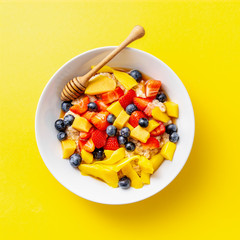 Homemade porridge served with fruits and berries
