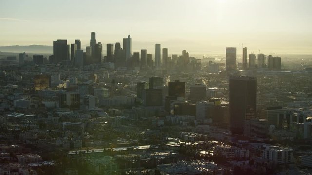 Aerial sunrise view commercial buildings Wilshire Boulevard LA