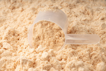 whey protein powder and spoon