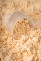 whey protein powder and spoon