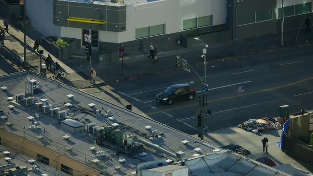 Aerial view vehicles at crossroads Skid Row LA