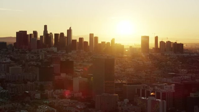Aerial sunrise view downtown LA buildings and skyscrapers