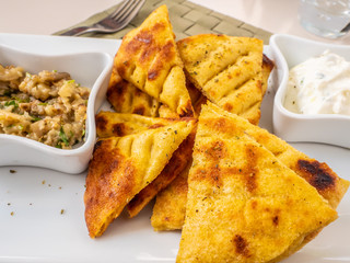 tasty and fresh Greek dish with pita bread, tzatziki and eggplant for lunch