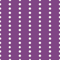 Vertical dotted lines seamless pattern in purple and white. Simple, classic design for textiles, paper and graphic design uses.