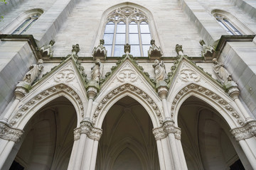 Beautiful exterior elements of the evangelical church in Germany. Exterior of evangelical church with statues