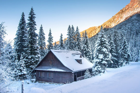 Winter. Christmas Background. Frosty Mountain Landscape. Beautiful Winter Scene With Wooden House In Tatra Mountains