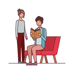 couple sitting on chair with book in hands