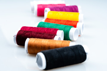 Fototapeta na wymiar colorful cotton sewing threads reels