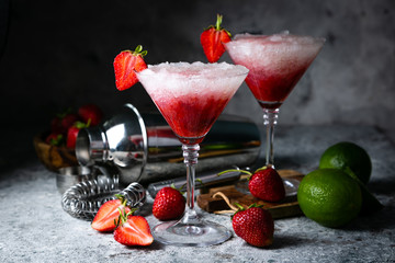 Strawberry margarita cocktail and ingredients, copy space