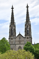 Beautiful and tall towers on evangelical church in Europe against the sky, Germany