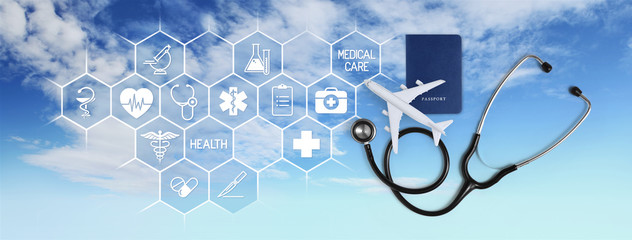 international medical travel insurance concept, stethoscope, passport and airplane, with icons and...
