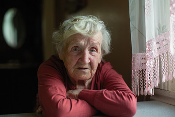 Closeup portrait of elderly woman..Russian old-age pensioner.