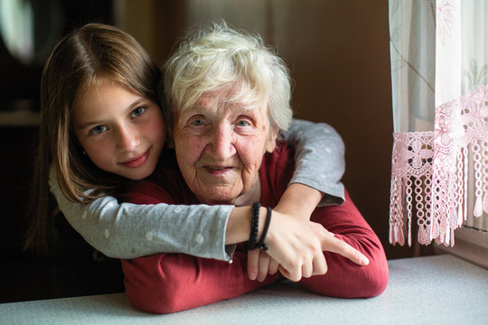 Portraits of the little girl and her old grandmother.