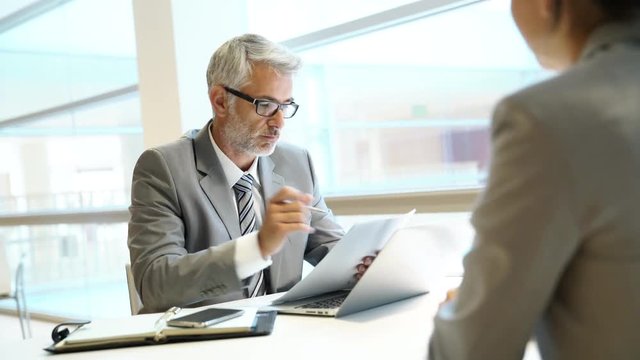 Coporate interview between executive and employee