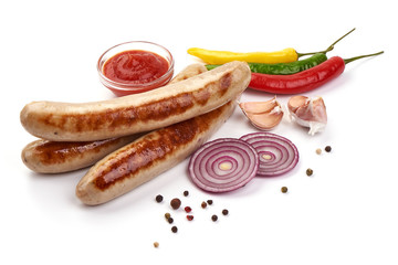 Grilled German white sausages, Thuringer Rostbratwurst, close-up, isolated on white background