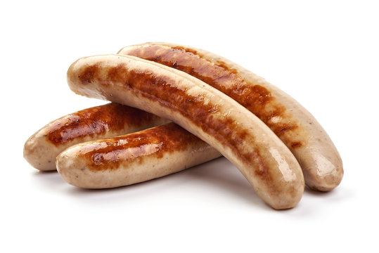 Grilled German pork sausages, Thuringer Rostbratwurst, close-up, isolated on white background