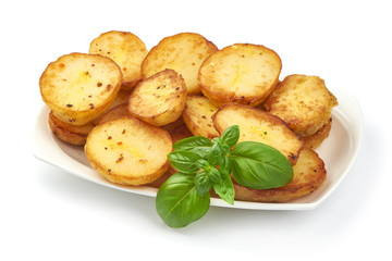 Baked halves of Potatoes, close-up, isolated on white background